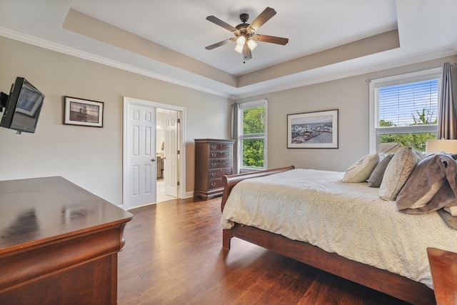 6740 Falls Ridge Ln, College Grove, TN 37046 - bedroom with a tray ceiling, wood finished floors, ceiling fan, baseboards, and ornamental molding