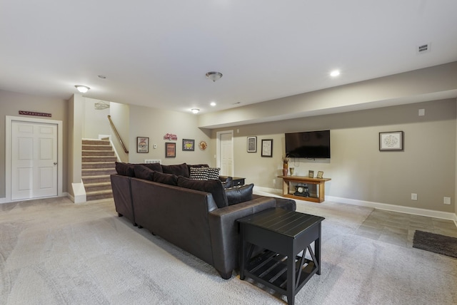 6740 Falls Ridge Ln, College Grove, TN 37046 - living area with light colored carpet, stairs, baseboards, and recessed lighting