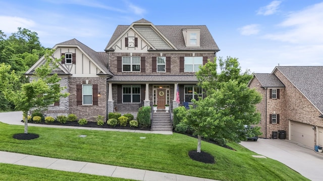 6740 Falls Ridge Ln, College Grove, TN 37046 - craftsman inspired home featuring a porch, concrete driveway, brick siding, and a front yard