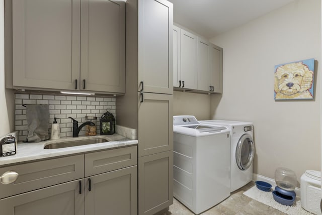 6740 Falls Ridge Ln, College Grove, TN 37046 - laundry area with cabinet space, washing machine and dryer, and baseboards