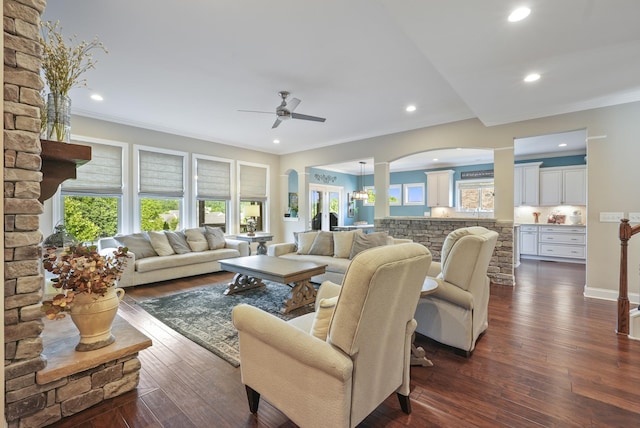 6740 Falls Ridge Ln, College Grove, TN 37046 - living room with arched walkways, a ceiling fan, dark wood-type flooring, recessed lighting, and ornamental molding