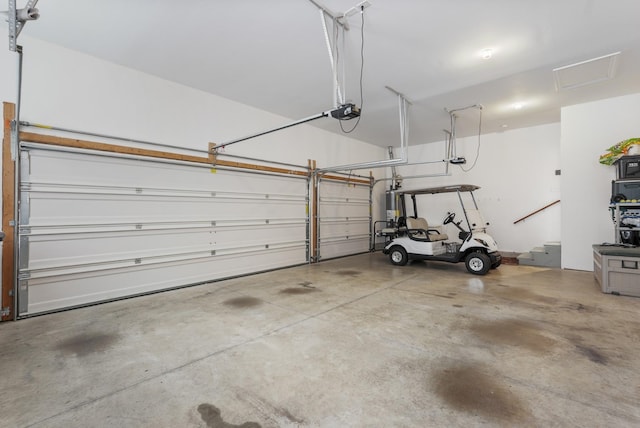 6740 Falls Ridge Ln, College Grove, TN 37046 - garage featuring a garage door opener