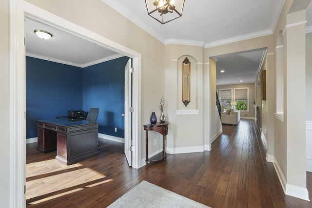 6740 Falls Ridge Ln, College Grove, TN 37046 - entryway featuring dark wood finished floors, a chandelier, crown molding, and baseboards