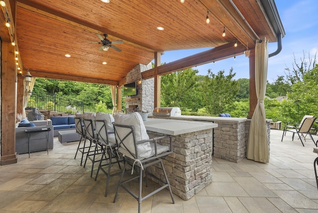 6740 Falls Ridge Ln, College Grove, TN 37046 - view of patio / terrace featuring exterior kitchen and ceiling fan