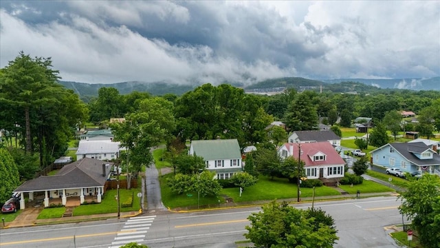 412 Cumberland St E, Cowan, TN 37318 - aerial perspective of suburban area with mountains