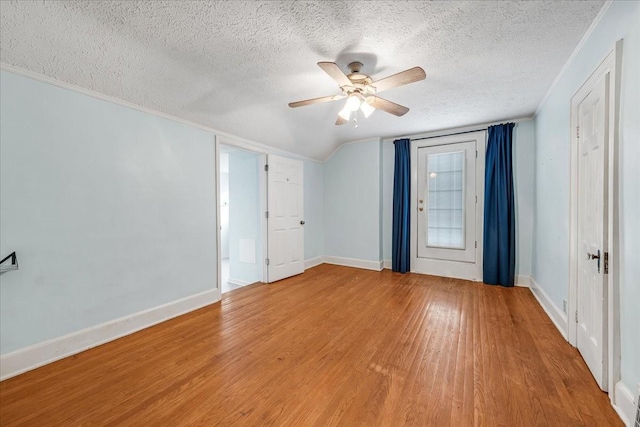 412 Cumberland St E, Cowan, TN 37318 - spare room featuring light wood finished floors, a textured ceiling, and ceiling fan
