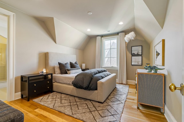 7212 Shagbark Ln, College Grove, TN 37046 - bedroom with light wood-type flooring, lofted ceiling, baseboards, and recessed lighting