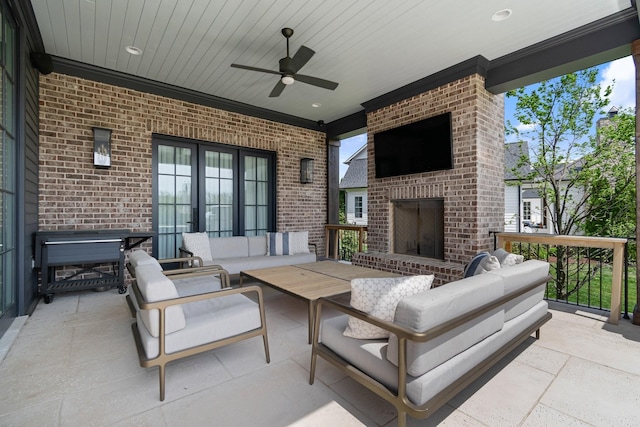 7212 Shagbark Ln, College Grove, TN 37046 - view of patio with an outdoor living space with a fireplace and a ceiling fan