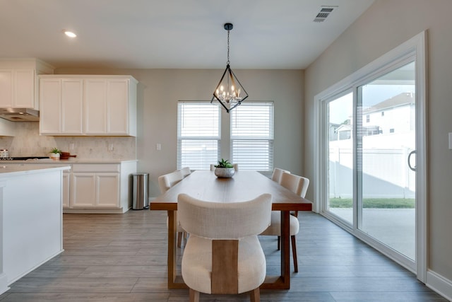 1207 Bridgett Way, Mount Juliet, TN 37122 - dining area with a chandelier, light wood finished floors, and recessed lighting