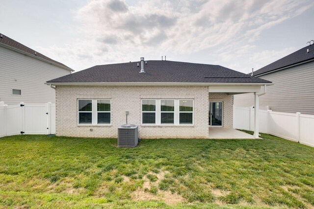 1207 Bridgett Way, Mount Juliet, TN 37122 - back of house with a patio, brick siding, central air condition unit, and roof with shingles