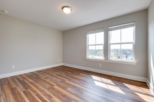 1207 Bridgett Way, Mount Juliet, TN 37122 - empty room with baseboards, wood finished floors, and a smoke detector
