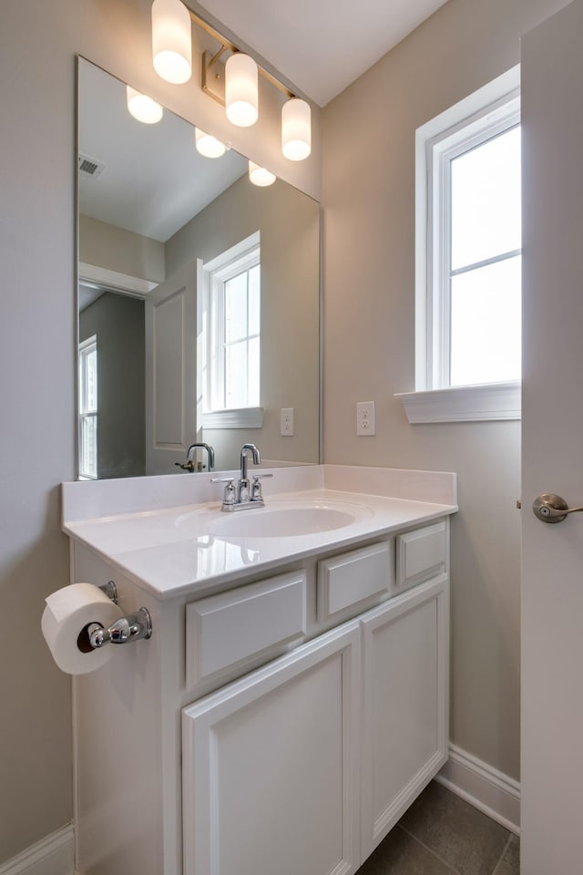 1207 Bridgett Way, Mount Juliet, TN 37122 - bathroom with vanity, baseboards, and tile patterned flooring