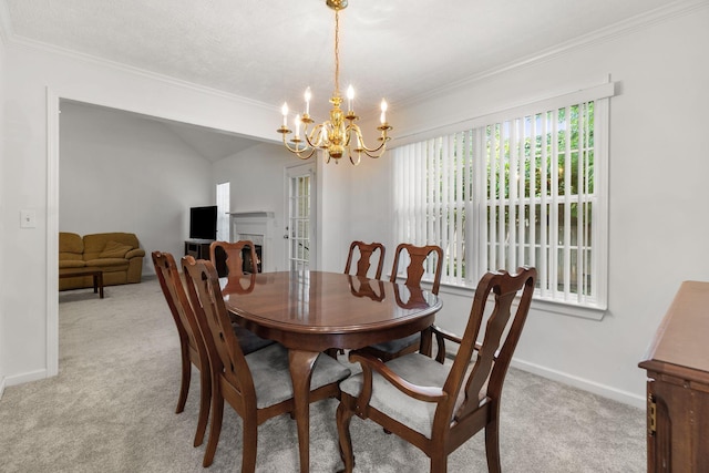 2707 Comer Dr, Murfreesboro, TN 37128 - dining space featuring light carpet, ornamental molding, a chandelier, and baseboards