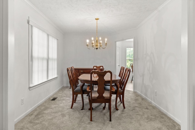 2707 Comer Dr, Murfreesboro, TN 37128 - dining room featuring a chandelier, light colored carpet, a textured ceiling, ornamental molding, and baseboards