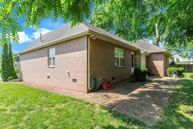 2707 Comer Dr, Murfreesboro, TN 37128 - view of side of home with crawl space, brick siding, a patio, and roof with shingles