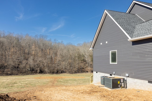 5580 Chambers Rd, Cumberland Furnace, TN 37051 - view of yard featuring central AC and a forest view