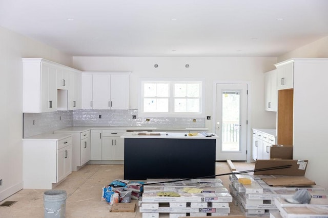 5570 Chambers Rd, Cumberland Furnace, TN 37051 - kitchen with healthy amount of natural light, decorative backsplash, and a center island