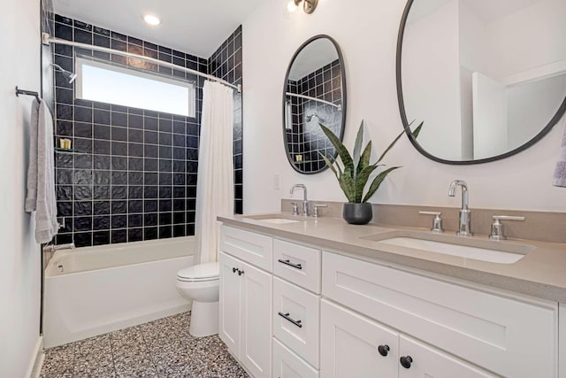 606A 41st Ave N, Nashville, TN 37209 - full bathroom featuring toilet, double vanity, and shower / bath combo