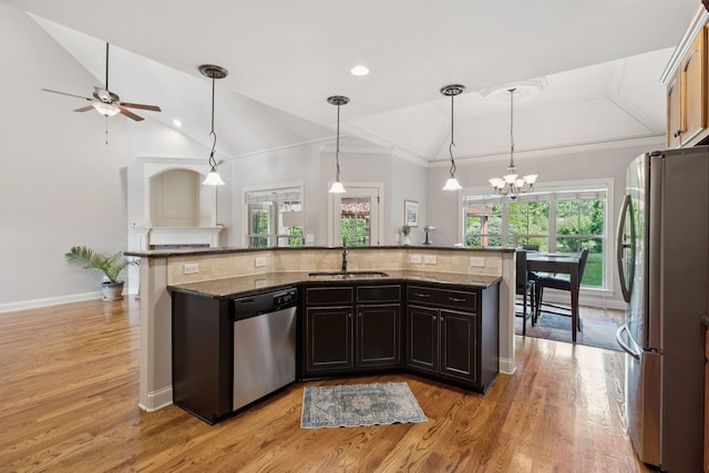 4181 Miles Johnson Pkwy, Spring Hill, TN 37174 - kitchen featuring appliances with stainless steel finishes, a sink, vaulted ceiling, a ceiling fan, and dark stone counters