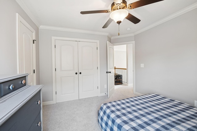 4181 Miles Johnson Pkwy, Spring Hill, TN 37174 - bedroom with light colored carpet, crown molding, a closet, ceiling fan, and baseboards
