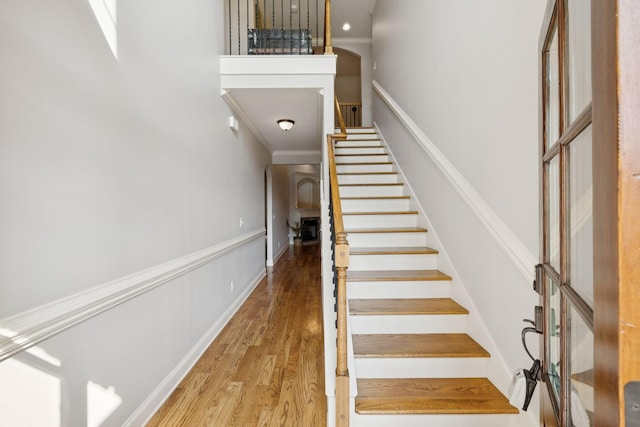 4181 Miles Johnson Pkwy, Spring Hill, TN 37174 - stairway featuring wood finished floors and crown molding