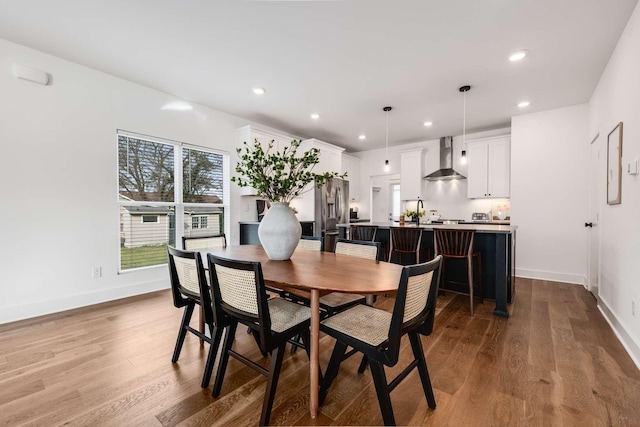 606B 41st Ave N, Nashville, TN 37209 - dining area with baseboards, wood finished floors, and recessed lighting