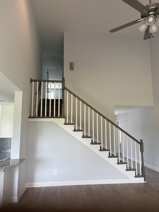 3329 Curie Cir, Christiana, TN 37037 - stairway with ceiling fan and wood finished floors