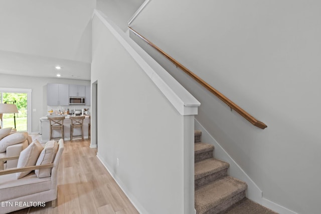 324 Gulfstream Dr, Gallatin, TN 37066 - staircase with wood finished floors, recessed lighting, and baseboards