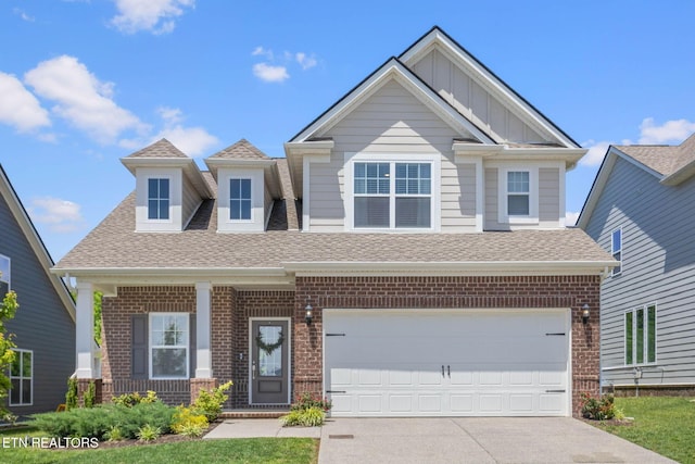 324 Gulfstream Dr, Gallatin, TN 37066 - craftsman-style home featuring concrete driveway, brick siding, roof with shingles, board and batten siding, and a garage