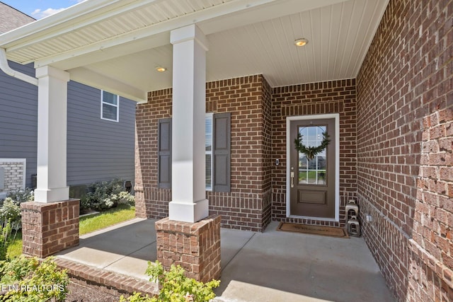 324 Gulfstream Dr, Gallatin, TN 37066 - view of exterior entry with brick siding and covered porch
