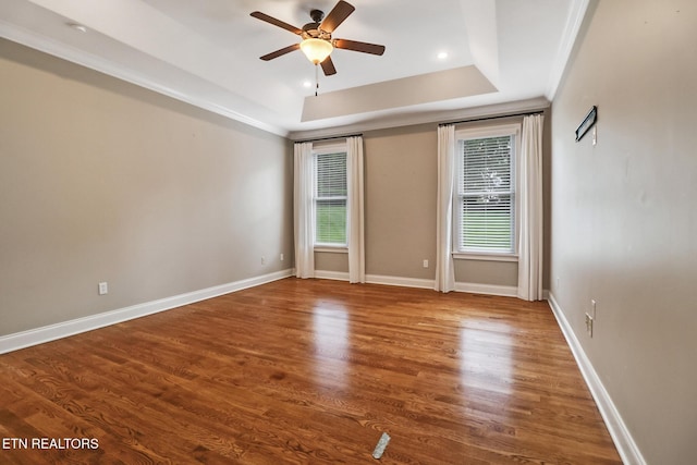 550 Stone Villa Ln, Knoxville, TN 37934 - spare room featuring a raised ceiling, a ceiling fan, wood finished floors, baseboards, and recessed lighting