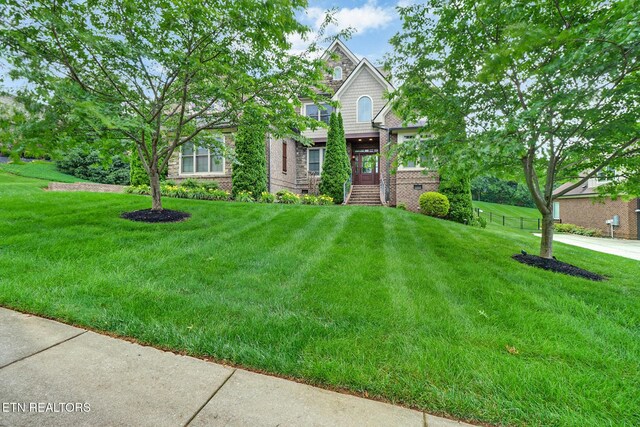 550 Stone Villa Ln, Knoxville, TN 37934 - view of front of home with a front yard and brick siding