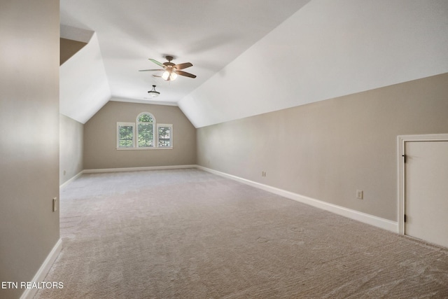 550 Stone Villa Ln, Knoxville, TN 37934 - additional living space featuring vaulted ceiling, carpet flooring, ceiling fan, and baseboards