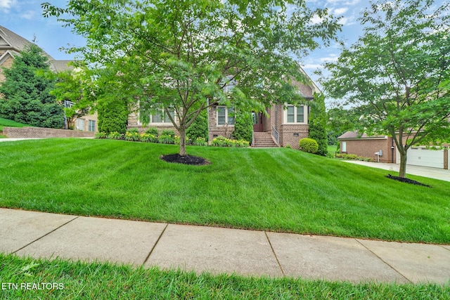 550 Stone Villa Ln, Knoxville, TN 37934 - obstructed view of property with a front lawn and brick siding