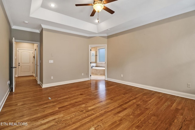 550 Stone Villa Ln, Knoxville, TN 37934 - unfurnished room with ceiling fan, wood finished floors, baseboards, a raised ceiling, and crown molding