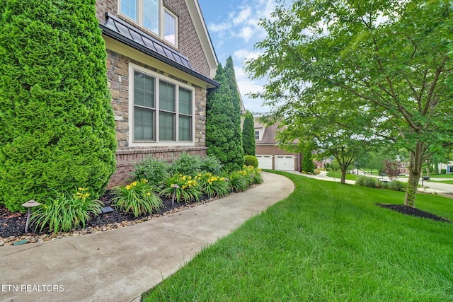 550 Stone Villa Ln, Knoxville, TN 37934 - view of home's exterior with stone siding and a yard