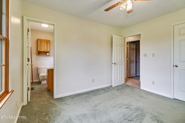1396 N York Hwy Unit 1396, Jamestown, TN 38556 - unfurnished bedroom with carpet floors, baseboards, and connected bathroom