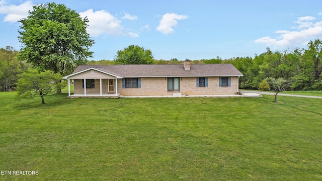 1396 N York Hwy Unit 1396, Jamestown, TN 38556 - ranch-style home with a front lawn, brick siding, and a chimney