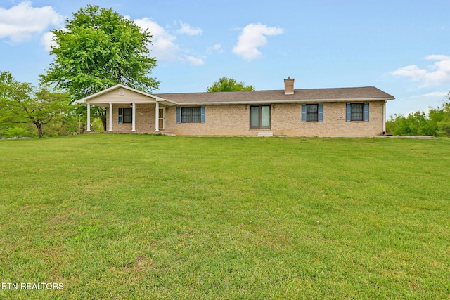 1396 N York Hwy Unit 1396, Jamestown, TN 38556 - ranch-style home featuring brick siding, a front yard, and a chimney