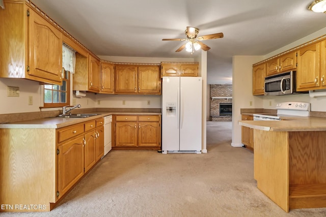 1396 N York Hwy Unit 1396, Jamestown, TN 38556 - kitchen with white appliances, a sink, ceiling fan, light carpet, and light countertops