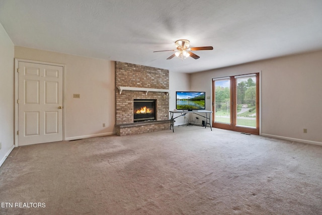 1396 N York Hwy Unit 1396, Jamestown, TN 38556 - unfurnished living room with a ceiling fan, carpet, a fireplace, and baseboards