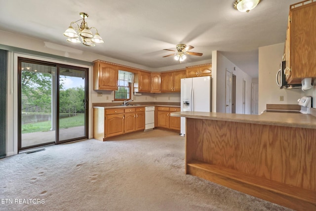 1396 N York Hwy Unit 1396, Jamestown, TN 38556 - kitchen featuring white appliances, a sink, light colored carpet, and ceiling fan