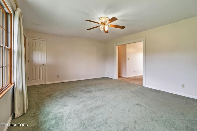1396 N York Hwy Unit 1396, Jamestown, TN 38556 - spare room featuring a ceiling fan, carpet flooring, and baseboards
