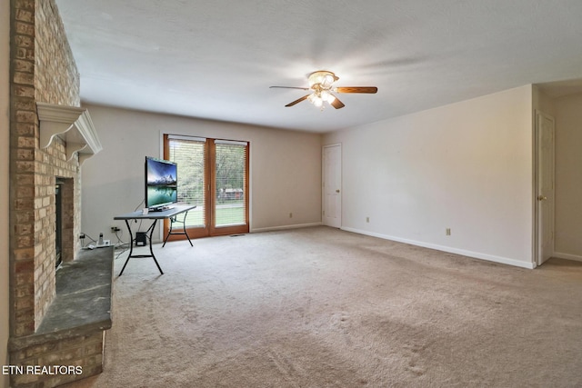 1396 N York Hwy Unit 1396, Jamestown, TN 38556 - unfurnished living room with ceiling fan, carpet floors, a brick fireplace, and baseboards