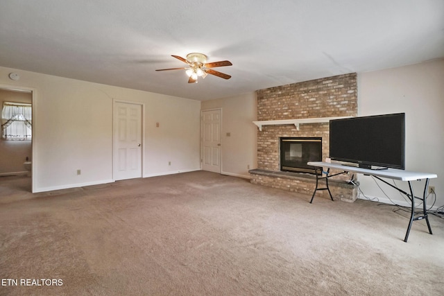 1396 N York Hwy Unit 1396, Jamestown, TN 38556 - unfurnished living room featuring a ceiling fan, carpet floors, a fireplace, and baseboards