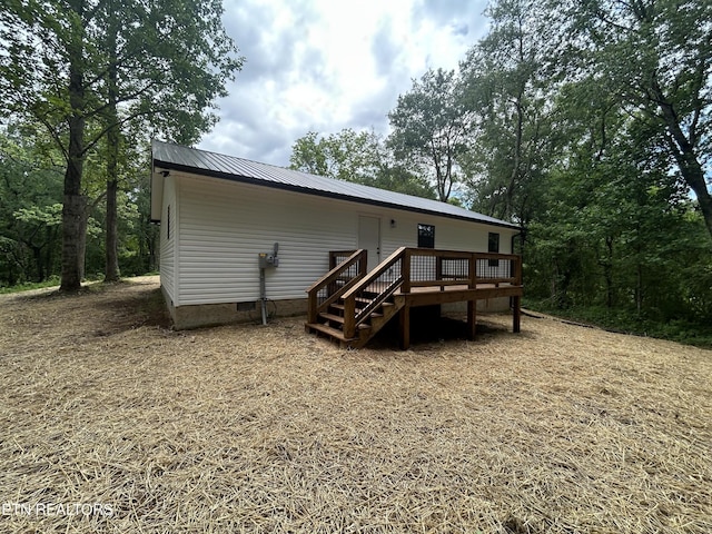 342 N Norris St, Jamestown, TN 38556 - back of property with a deck, crawl space, and metal roof