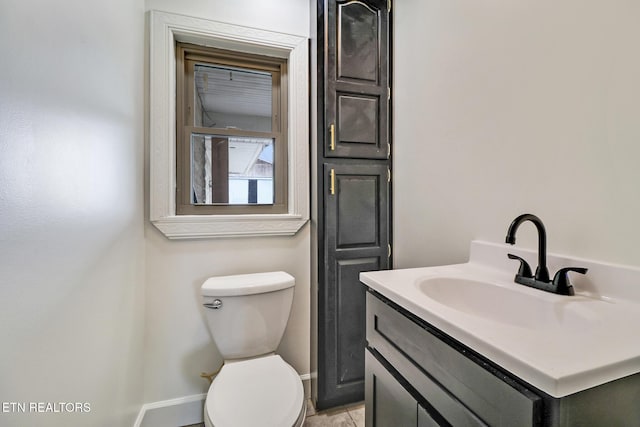 1128 Allardt Hwy, Jamestown, TN 38556 - bathroom featuring vanity, toilet, and baseboards