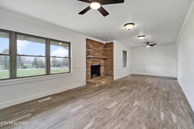1128 Allardt Hwy, Jamestown, TN 38556 - unfurnished living room with a ceiling fan, ornamental molding, wood finished floors, and baseboards