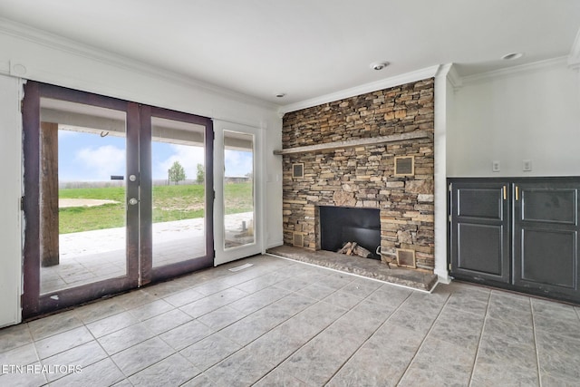1128 Allardt Hwy, Jamestown, TN 38556 - unfurnished living room with french doors, ornamental molding, light tile patterned floors, and a stone fireplace