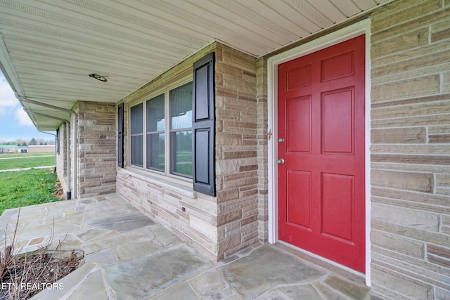 1128 Allardt Hwy, Jamestown, TN 38556 - doorway to property with a porch and brick siding